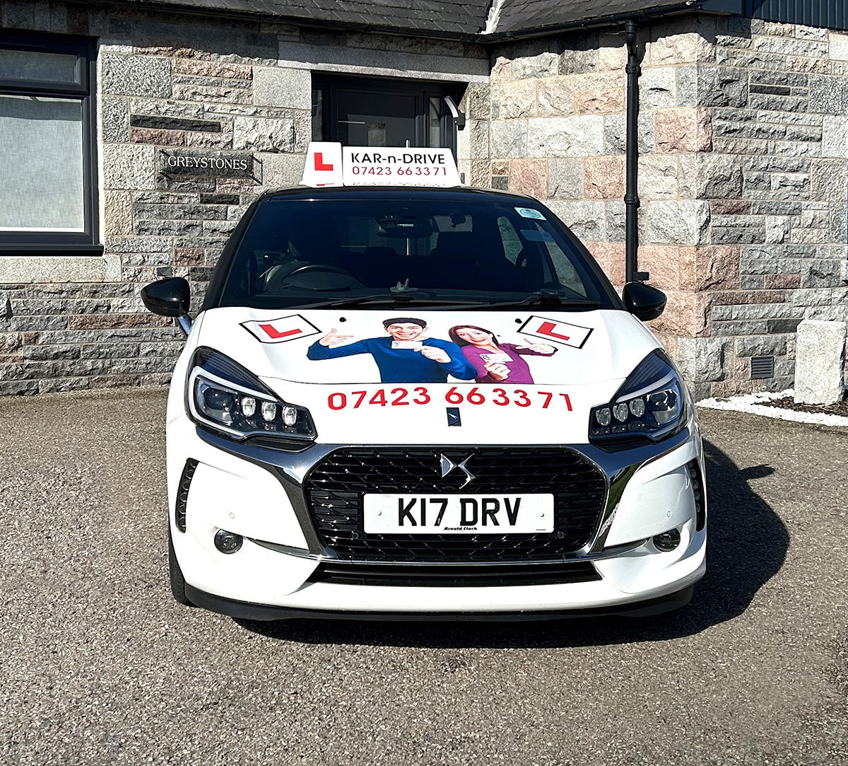 front view of the driving school car