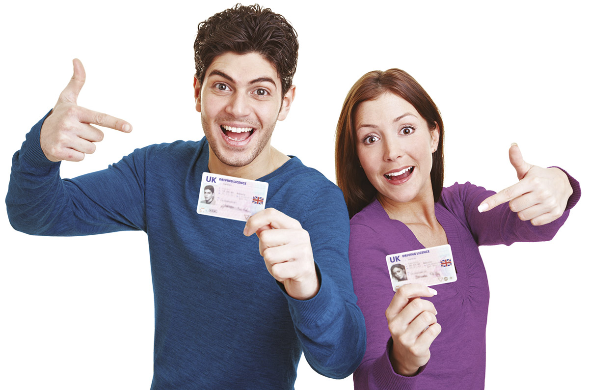 young male and female dhowing their newly passed driver's licence